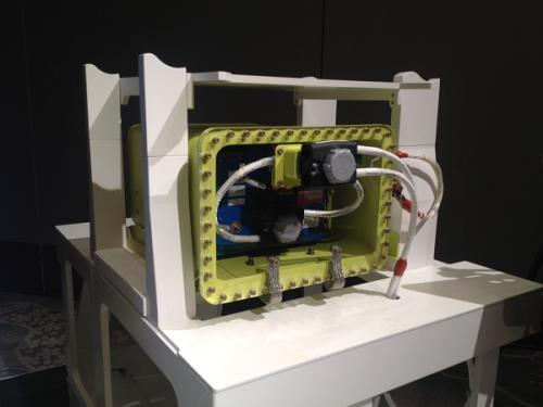 New 787 battery enclosure, shown within electrical equipment rack for scale